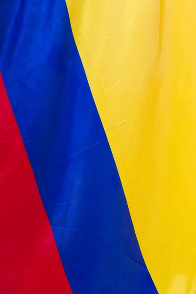 Closeup detail of the Colombian flag backdrop