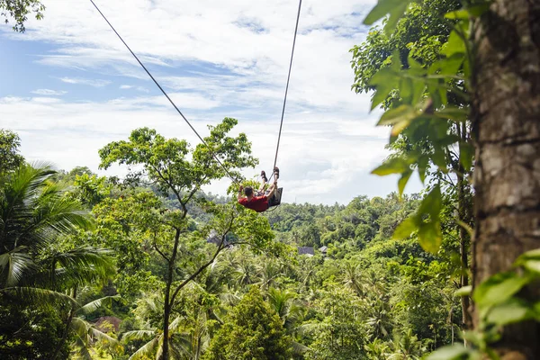 Young Male Tourist Swinging Cliff Jungle Rainforest Tropical Bali Island — Stock Photo, Image