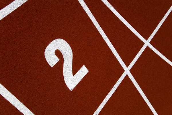 Primer Plano Del Número Dos Pista Atletismo Del Estadio Rojo — Foto de Stock