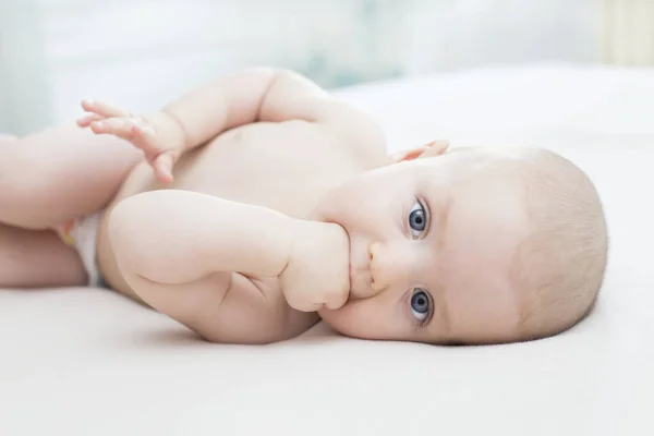 Cute Little Baby Girl Lying Hand Mouth — Stock Photo, Image