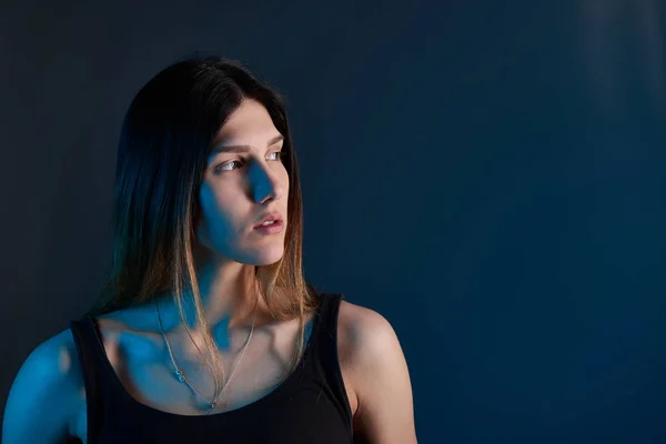 Closeup woman with blue backlit — Stock Photo, Image