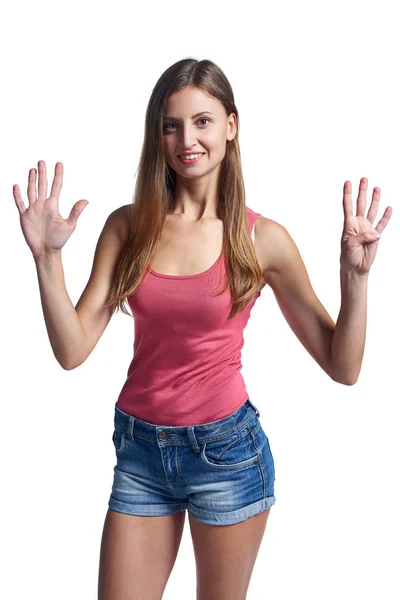 Happy woman in shorts showing nine fingers — Stock Photo, Image