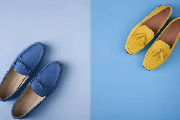 Blue suede man's and yellow woman's moccasins shoes over blue background — Stock Photo, Image