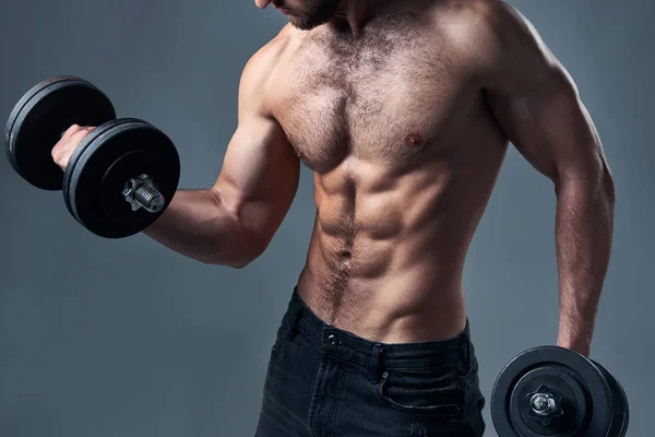 Cropped portrait of strong shirtless sport man with dumbbells isolated — Stock Photo, Image