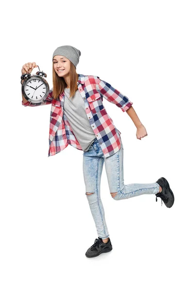 Smiling teen girl running hurrying, looking at camera — Stock Photo, Image