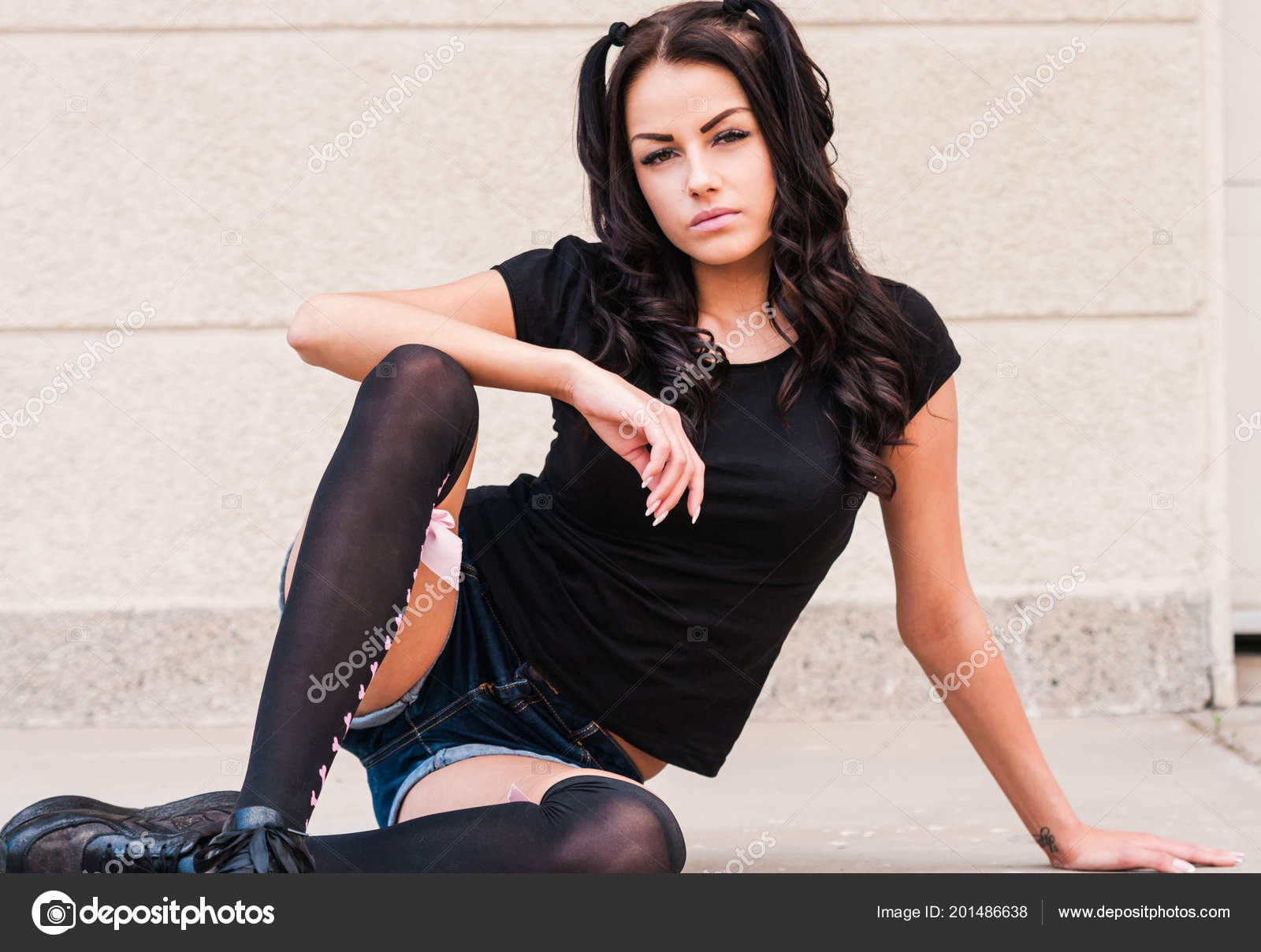 Girl In Denim Shorts And Black Stockings With Black Corset Stock Photo,  Picture and Royalty Free Image. Image 45989015.