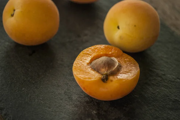 Sliced Apricots Isolated Black Background — Stock Photo, Image