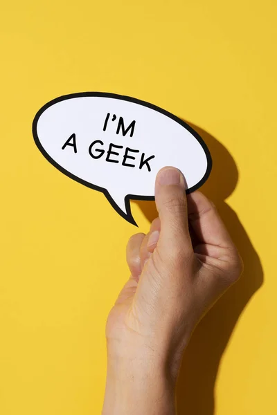 Closeup Hand Young Caucasian Man Speech Balloon Text Geek Written — Stock Photo, Image