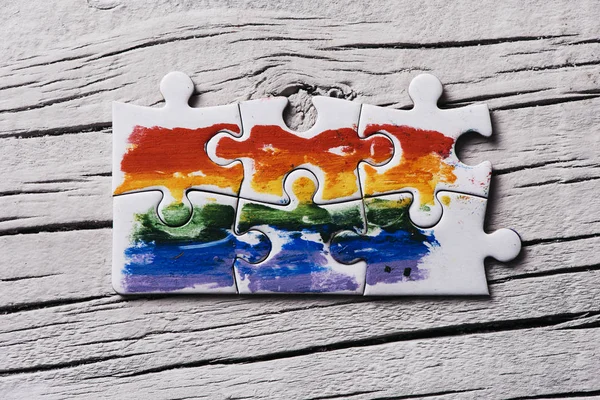 Einige Teile Die Eine Regenbogenfahne Bilden Auf Einer Weißen Rustikalen — Stockfoto
