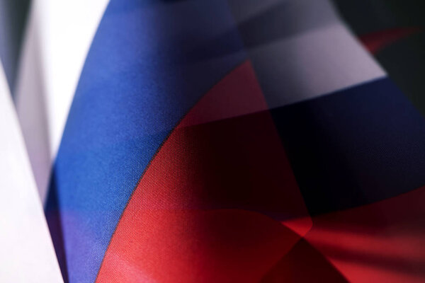 a double exposure of two different closeups of the flag of russia