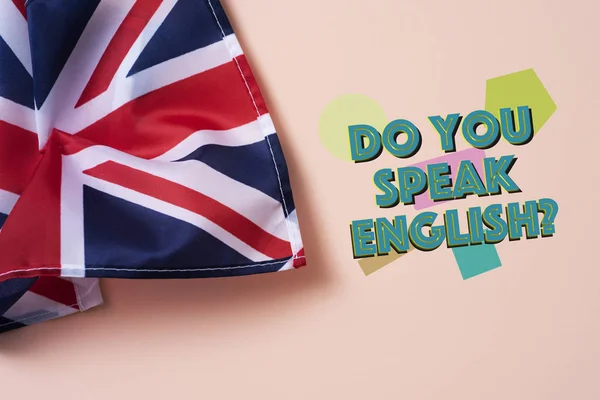 Eine Fahne Des Vereinigten Königreichs Und Die Frage Englisch Sprichst — Stockfoto