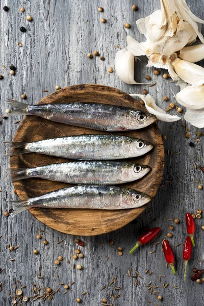 High Angle View Some Raw Sardines Boxwood Plate Placed Gray — Stock Photo, Image