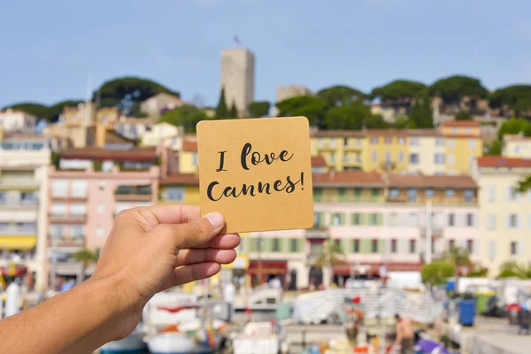 Closeup Young Caucasian Man Holding Brown Signboard Text Love Cannes — Stock Photo, Image