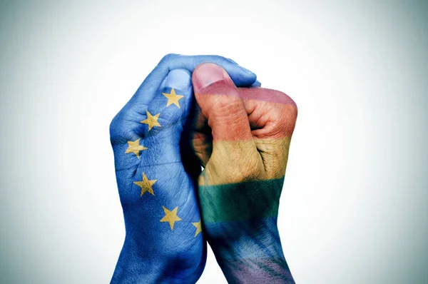 Closeup Hands Man Put Together Patterned Flag European Union Rainbow — Stock Photo, Image