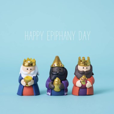 three wise men ve mutlu Epifani gün mavi bir arka plan üzerinde metin