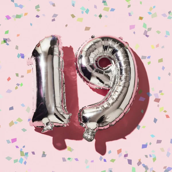 Some Confetti Some Silvery Number Shaped Balloons Forming Number Pink — Stock Photo, Image