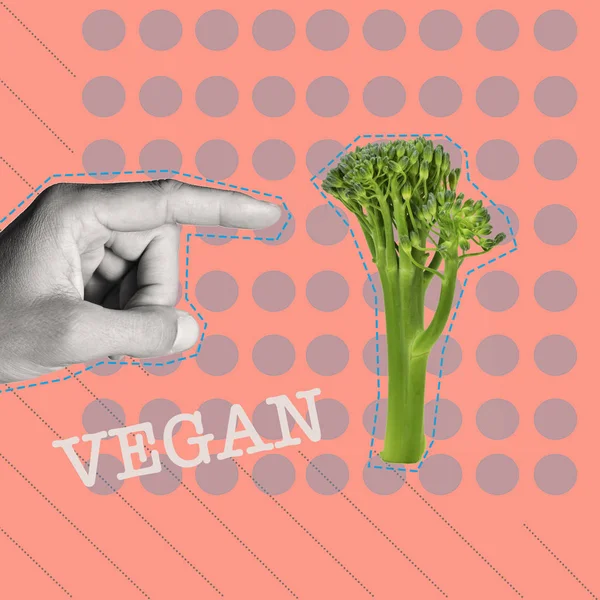 Text Vegan Ruka Muže Černé Bílé Polohovací Větvička Broccolini Růžovém — Stock fotografie