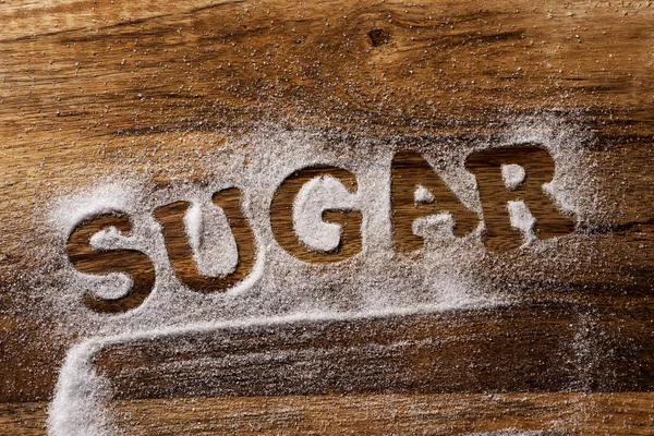 High Angle View Wooden Table Sprinkled Sugar You Can Read — Stock Photo, Image