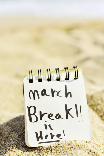 Text march break is here on the beach — Stock Photo, Image