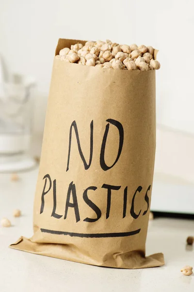 text no plastics in a paper bag full of chickpea