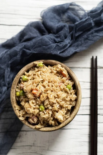 Chinese fried rice in a boxwood bowl — Stock Photo, Image