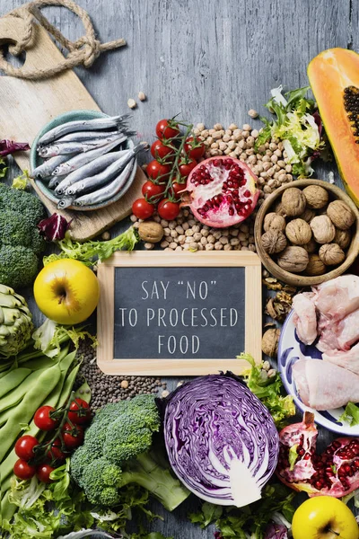 Natural food and text say no to processed foo — Stock Photo, Image