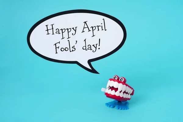 Funny denture and text happy april fools day — Stock Photo, Image
