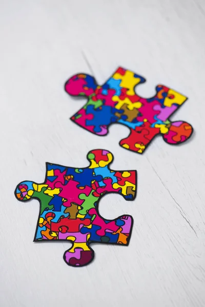 Kawałki układanki, symbolem świadomości autyzmu — Zdjęcie stockowe
