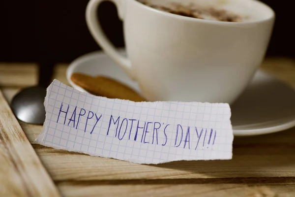 Text happy mothers day in a piece of paper — Stock Photo, Image