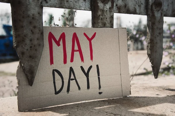 Text may day in a brown cardboard signboard — Stock Photo, Image