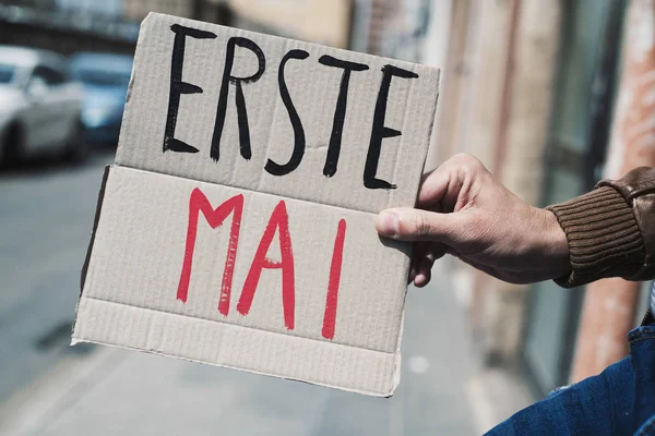Text may day in german in a cardboard signboard — Stock Photo, Image