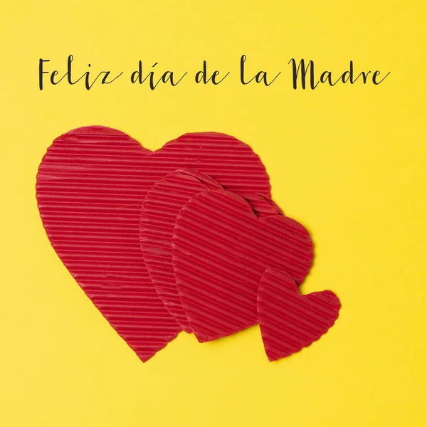 Harten en tekst Happy Mothers Day in het Spaans — Stockfoto