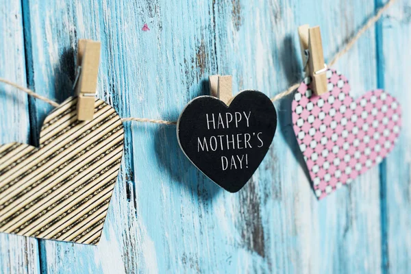 Corazones y texto feliz día de las madres — Foto de Stock