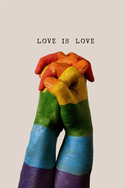Arco iris bandera y texto amor es amor — Foto de Stock