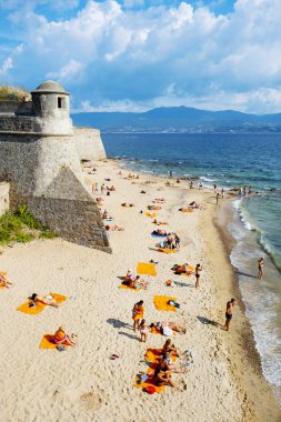 people on the beach in Ajaccio, Corsica, France clipart