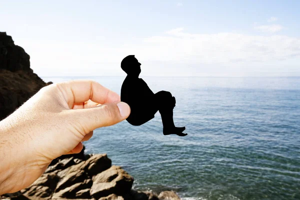 Silhouette d'un homme se jetant à la mer — Photo