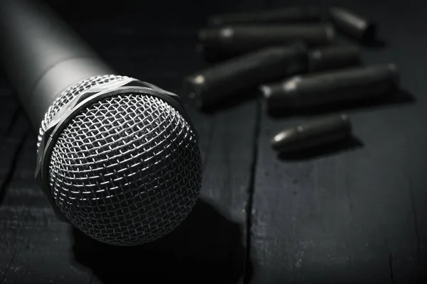 Microphone and bullets — Stock Photo, Image