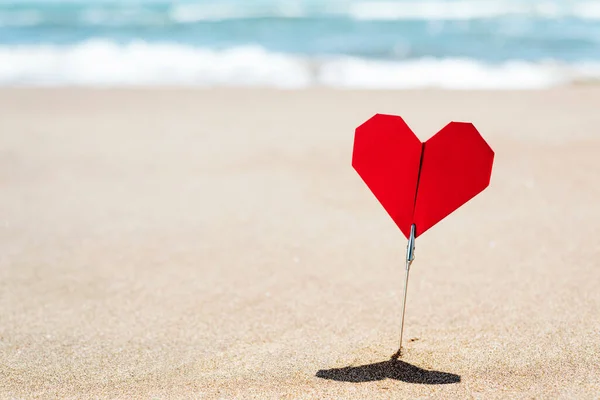Closeup Red Origami Heart Stuck Sand Quiet Beach Sea Background — Stock Photo, Image
