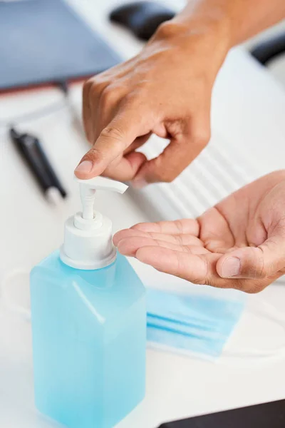 Closeup Young Caucasian Man Disinfecting His Hands Hand Sanitizer Sitting — Stock Photo, Image