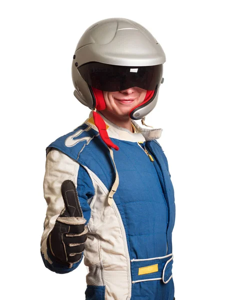 Piloto de fórmula profesional que usa un traje de carreras para deportes de motor. Pulgares arriba . — Foto de Stock