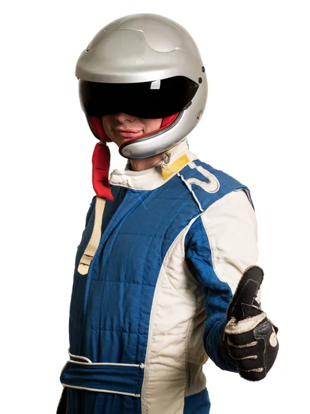 Piloto de fórmula profesional que usa un traje de carreras para deportes de motor. Pulgares arriba . — Foto de Stock