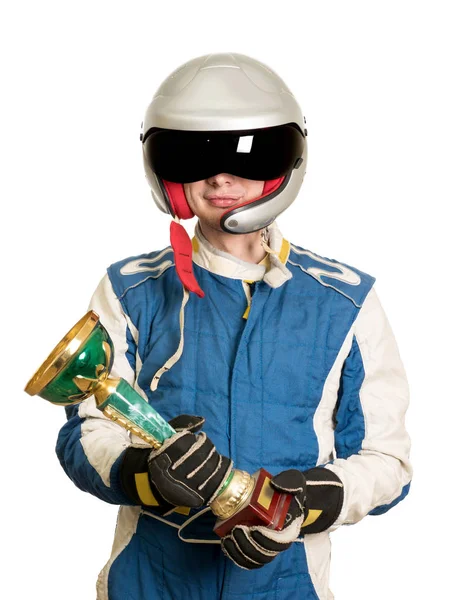 Ritratto di un pilota maschio vincitore con una coppa di trofeo d'oro isolata su bianco — Foto Stock