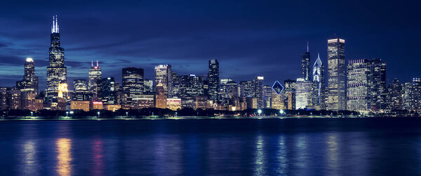 Famous view of Chicago skyline by night, USA.