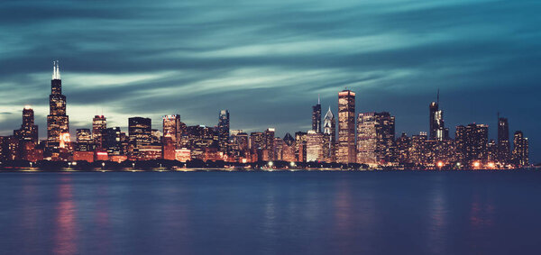 Panoramic view of Chicago skyline by night, USA, special photographic processing.