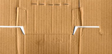 kahverengi kıvrımlı karton dokusu arka plan olarak kullanışlı