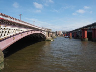 Blackfriars Bridge over River Thames in London, UK clipart