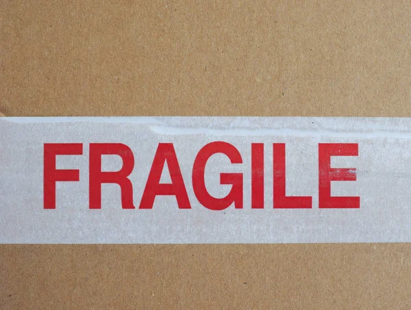Fragile Warning Tape Brown Corrugated Cardboard — Stock Photo, Image