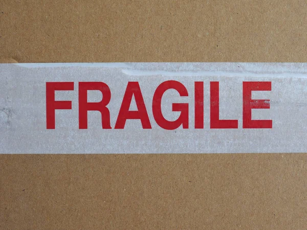 Fragile Warning Tape Brown Corrugated Cardboard — Stock Photo, Image