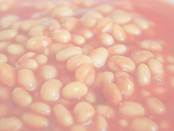 番茄酱中烘焙豆的细节 精致柔和的褪色色调作为背景 — 图库照片