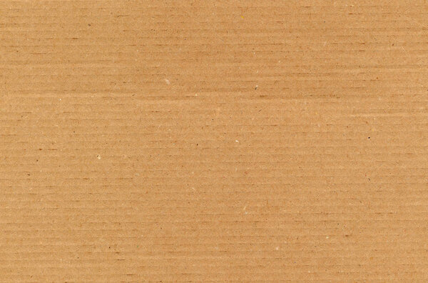 Коричневый гофрированный картон текстуры полезны в качестве фона, мягкий пастельный цвет
